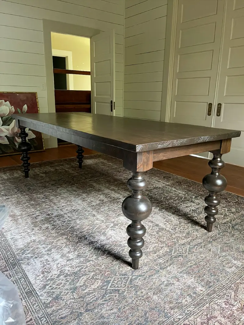 Modern turned leg dining table side view
